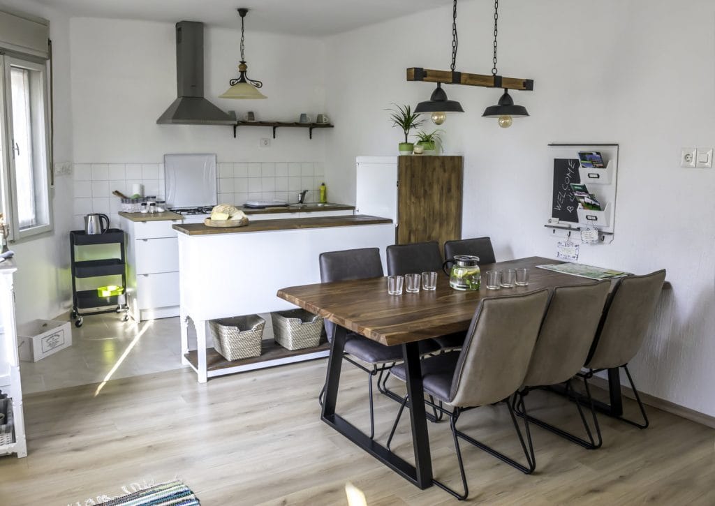 A table for 6 in a living room in an appartment in Bovec.
