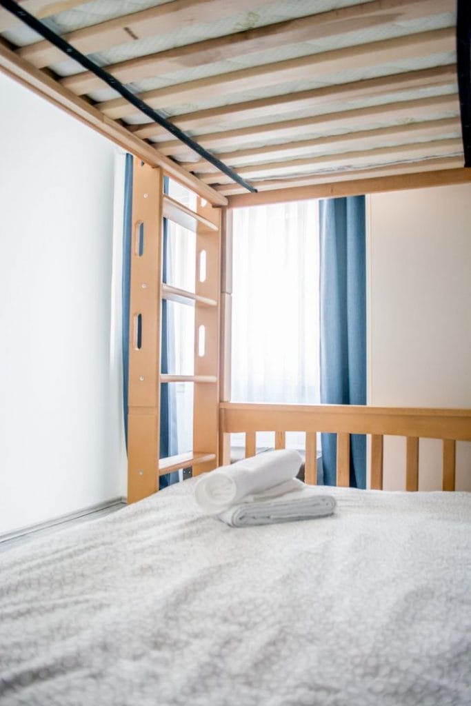 A bunkbed with clean towels waiting for guests to arrive in Bovec.