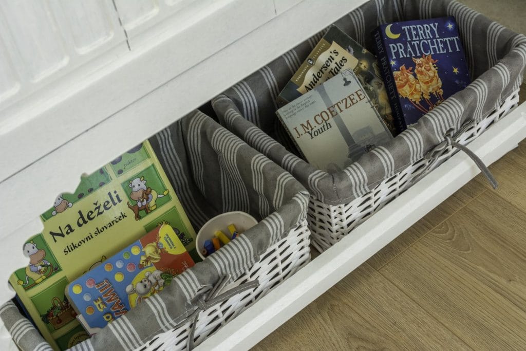 Some books for children in the living room.