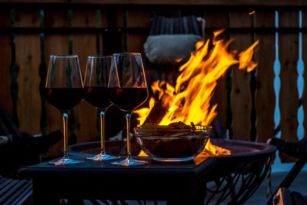 Relaxing evening at the fireplace in Bovec after canyoning tour.