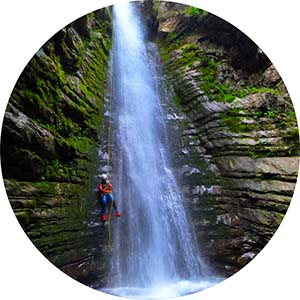 Canyoning in Soca valley down the waterfall into the crystal clear pool of Globoski creek. Click to see more canyons.